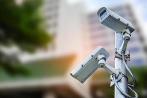 CCTV Closed circuit camera, TV monitoring at modern office building construction, security system concept. photo