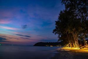 Purple violet sky at the beach and sea, in Twilight Time, Koh Kood, Trad province, Thailand. photo