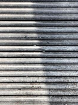 Roll steel sticks are arrange in the line like a pattern background. photo