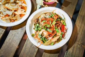 Three Shells Thai spicy salad style in foodtruck event. photo