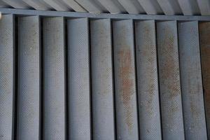 steel stair with container beside. photo