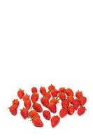 Fresh luxury Strawberry are disrupted in the group area with studio light on the white background. photo