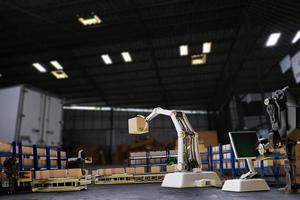 AI Robot arm Object for manufacturing industry technology Product export and import of future Robot cyber in the warehouse by hand mechanical future technology photo