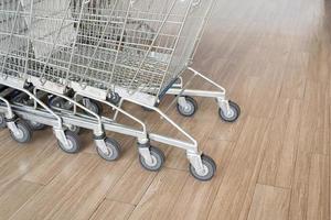 shopping carts stacked together with copy space. photo