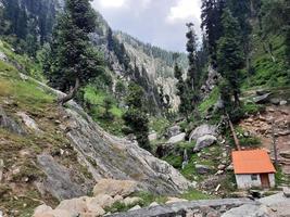 Kashmir is the most beautiful region in the world which is famous for its green valleys, beautiful trees, high mountains and flowing springs. photo