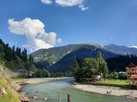 Kashmir is the most beautiful region in the world which is famous for its green valleys, beautiful trees, high mountains and flowing springs. photo