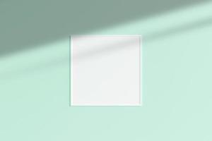 Realistic white square photo frame mockup hanging on empty wall room with shadow. 3d rendering.