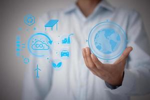 Technology, hand holding with environment Icons over the Network connection. Environmental technology concept. photo