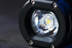 Led black lantern close-up on gray textured background photo