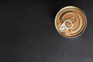 Metal lid with a ring from a tin can photo