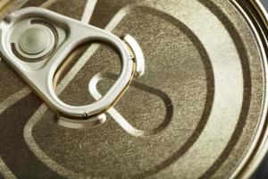 Metal lid with a ring from a tin can photo