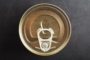 Metal lid with a ring from a tin can photo