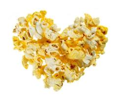 Cheese popcorn with heart shape isolated on white background,top view photo