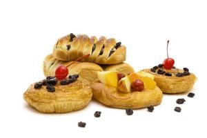 danish pastry with fruits isolated on white background photo