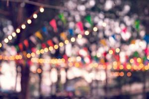 Party bokeh at night market festival,abstract blur image background photo