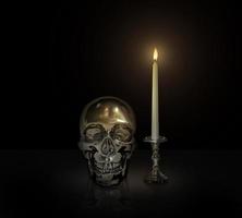 Iron skull and Candle light on a candlestick on a black background, Halloween day concept photo