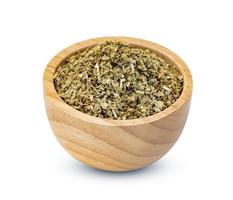 Oregano in wooden bowl isolated on white background ,include clipping path photo