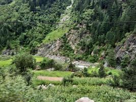 Kashmir is the most beautiful region in the world which is famous for its green valleys, beautiful trees, high mountains and flowing springs. photo