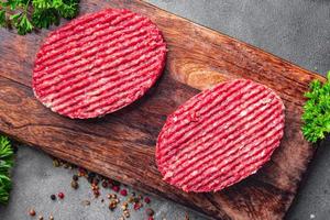 raw ground meat cutlet pork beef burger fresh dish meal food snack on the table copy space food background photo