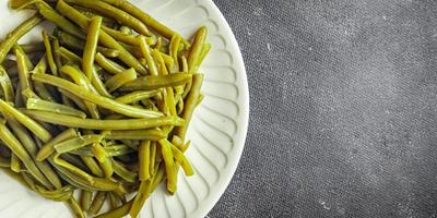 judías verdes enlatadas frijoles hervidos comida fresca y saludable comida merienda dieta en la mesa espacio de copia fondo de alimentos foto