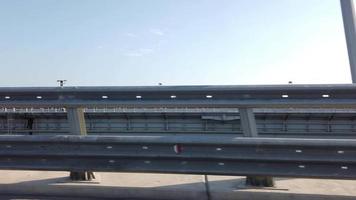 Landscape with a moving road barrier on the Crimean Bridge video