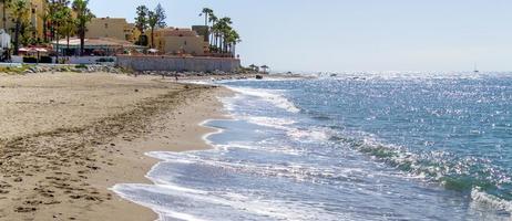 CALAHONDA, ANDALUCIA, SPAIN - MAY 6. Dona Lola beach in Calahonda Costa del Sol Spain on May 6, 2014. Unidentified people. photo