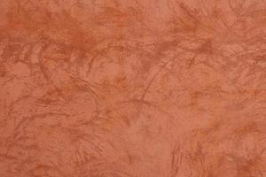 Orange-brown cement wall texture background, wallpaper abstract grunge pattern surface retro backdrop. photo