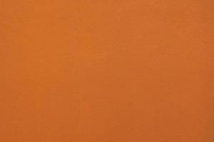 orange plaster wall texture background,Photograph of an empty yellow-orange area of a flap for placement of letters and documents. photo