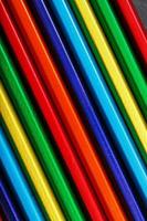 The texture of multi-colored pencils is close-up in full screen. photo