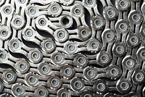 Bicycle chain as a close-up texture of torque transmission links photo