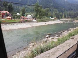 Kashmir is the most beautiful region in the world which is famous for its green valleys, beautiful trees, high mountains and flowing springs. photo