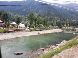 Kashmir, Pakistan, Aug 2022 - Kashmir is the most beautiful region in the world which is famous for its green valleys, beautiful trees, high mountains and flowing springs. photo