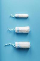 Gynecological tampons on a blue background free space photo