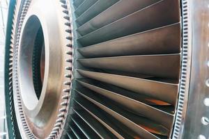 The blades of the gas turbine engine on the rotor disk. photo