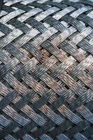 Metal texture with a herringbone pattern of steel. photo