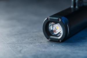 Led black lantern close-up on gray textured background photo