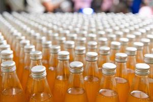 Ready-to-drink bottled juice products Arranged and packed in boxes for delivery to the next customer photo