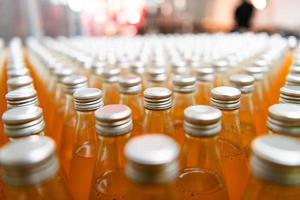 Ready-to-drink bottled juice products Arranged and packed in boxes for delivery to the next customer photo