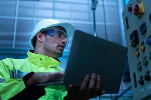 Chief Engineer of Mechanical Plant Checking the electronic circuit of the machine to check readiness photo