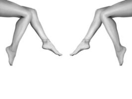 Two beautiful, smooth women's legs after laser hair removal. Treatment, technology concept photo