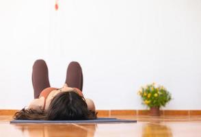 girl resting after doing yoga photo