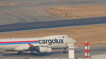 HONG KONG NOVEMBER 10, 2019 - Cargolux Boeing 747 LX GCL taxiing after landing. Chek Lap Kok International Airport, Hong Kong,. video