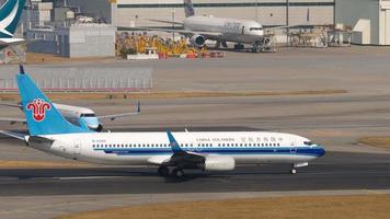 HONG KONG NOVEMBER 10, 2019 - China Southern Boeing 737 B 5340 turn runway and Mandarin Airlines Embraer E190 B 16821 taxiing before departure from Chek Lap Kok International Airport, Hong Kong,. video