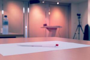 Pen and paper in meeting room,Vintage photo