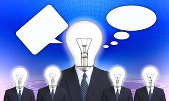 businessman  and lamp-head with thought bubble photo