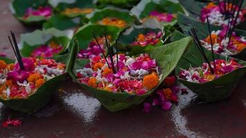 beautiful picture of flowers in leaf bowl. photo
