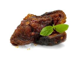 Stir Fried Crispy Catfish with Curry and leaf  fresh basil isolated on white background photo