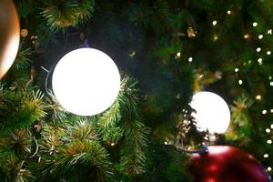 Closeup white lamp on christmas tree photo