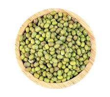 green mung beans with wooden bowl isolated on white background photo