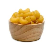 raw macaroni pasta with wooden bowl isolated on white background photo